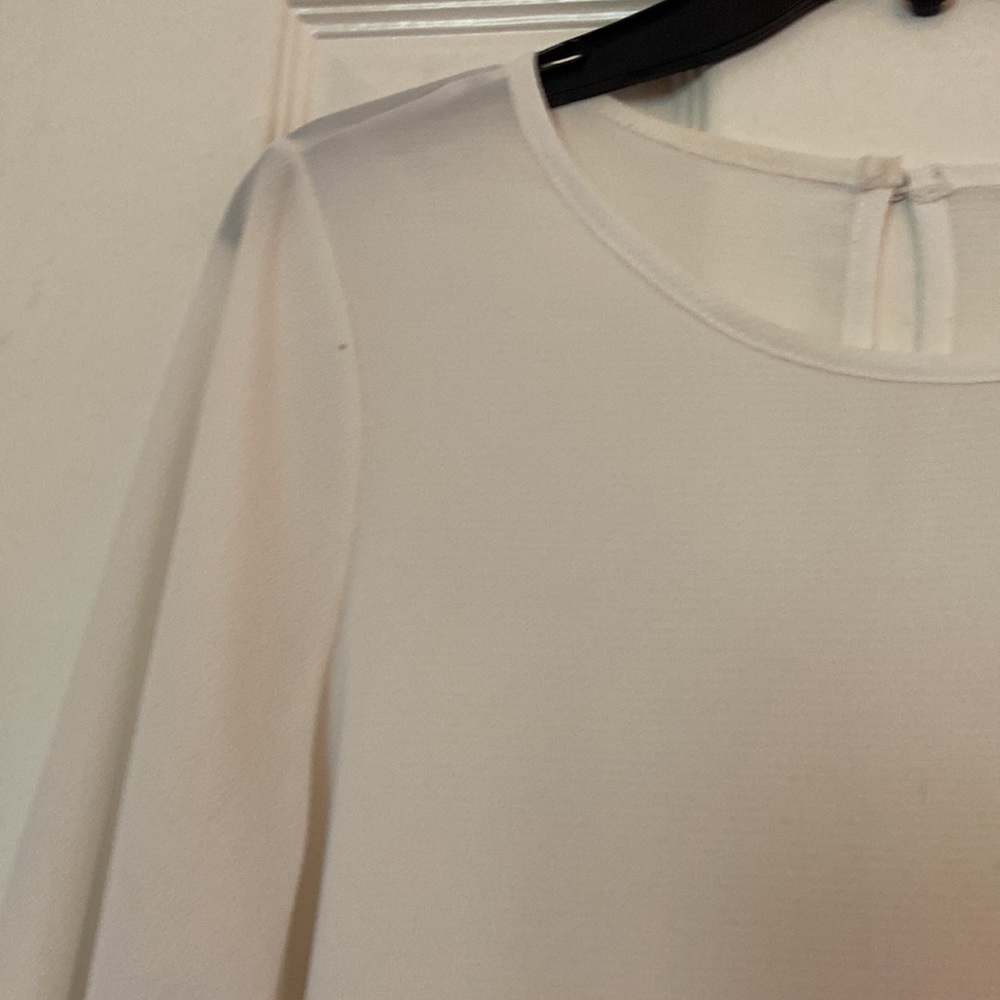 Cream blouse with flounce on sleeves and hem - Picture 5 of 5